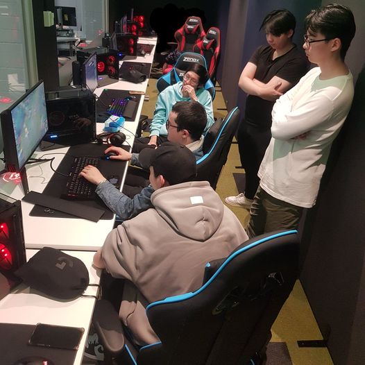 One of MEGA's eSports Teams playing a match within the room
